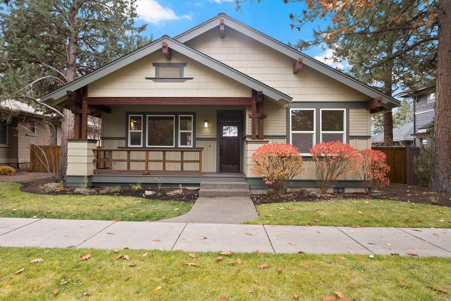 This beautifully renovated single-level home in the coveted NorthWest Crossing neighborhood perfectly blends craftsman charm with modern design. It features a spacious living area with vaulted ceilings & a cozy masonry fireplace, along with a large kitchen equipped with an island, quartz countertops, plus a walk-in pantry. The well-appointed primary suite includes a fully tiled shower & a walk-in closet. Throughout the home, you'll find engineered hardwood floors, a built-in desk area & an oversized two-car garage with a utility sink. The fully fenced yard, adorned with mature landscaping, is ideal for outdoor activities. Conveniently situated near parks, schools, shopping, and trails, this property also offers additional parking off the back alley for RV storage or potential backyard expansion, making it a perfect haven for modern living. Enjoy easy access to parks, restaurants, and abundant outdoor activities right from your doorstep.