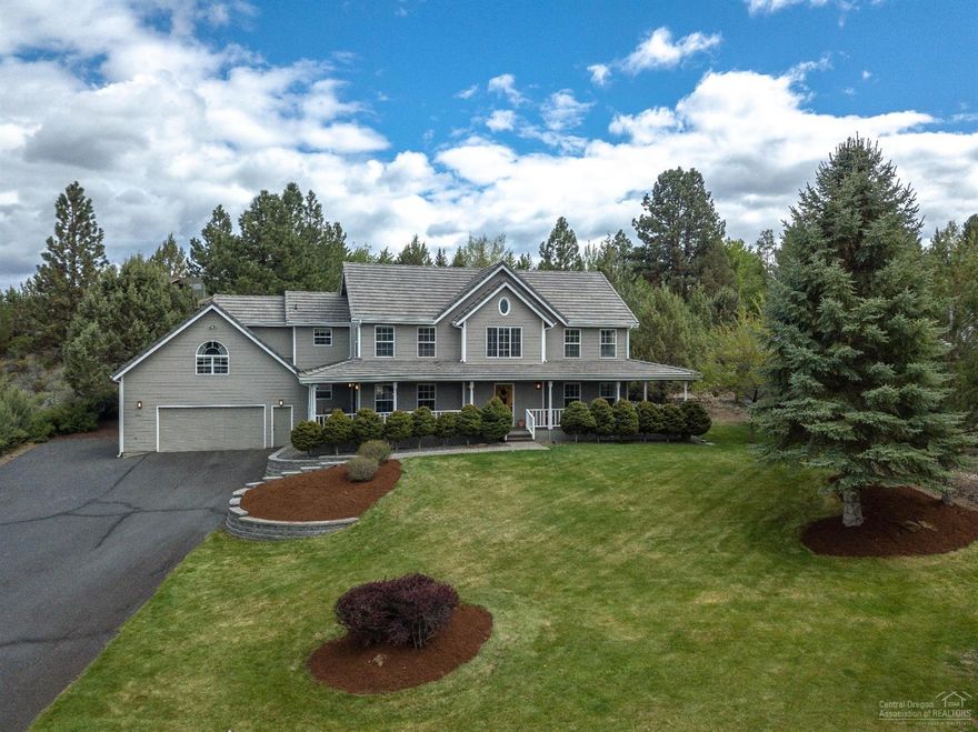 Turning into the driveway of this beautiful home you're welcomed with a lush, immaculate yard. Amenities include granite counters & SS appliances in kitchen, hardwood floors, huge master suite, & covered wrap-around porch. Enjoy your evenings in the hot tub that offers privacy & views of the natural landscaping. A large bonus room over the garage can be used as your work-out room, media room, or office. Luxurious Mtn Gate neighborhood on Bend's west side close to trails, Deschutes River & Mt Bachelor.