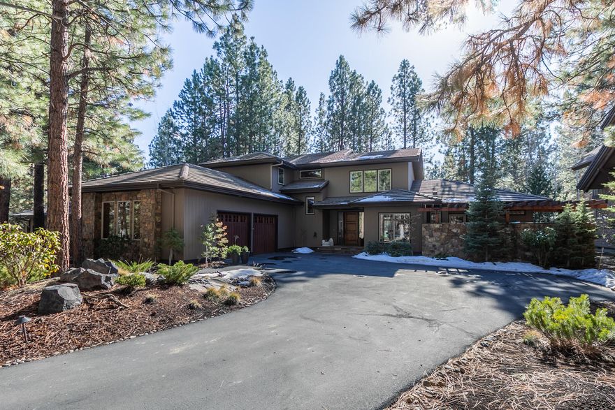 Spectacular south facing Sun Forest home situated along the 12th fairway in the desirable gated Broken Top Community. This beautify home offers single level living at its finest. The main floor features: A two story vaulted great room, custom wood work, a soaring Montana moss rock wood-burning fireplace and hardwood throughout. The gourmet kitchen with breakfast nook, Master-suite with private deck and hot tub, office, utility room and half bath are also on the main floor. The kitchen has slab granite counter tops, extensive cabinetry, stainless steel appliances and a professional gas cooktop. Upstairs you will find a large open loft and two additional bedrooms both with en-suites. The south facing deck runs the length of the home over-looking the award winning Broken Top golf course, tucked back for the ultimate privacy. To top it off the two-car garage is supersized providing ample space for all your needs.