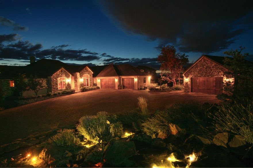 Perched among the foothills of East Medford this 80 acre exquisite estate boasts commanding views of the entire Rogue River Valley. The custom 4104 square foot home was well planned is elegantly appointed and renders attention to every detail. With four bedrooms, four baths, an office and a kitchen that is designed to cater to your culinary tastes this is truly a place to call home. The design of the home takes advantage of expansive windows and angles to gather colossal natural light. The grounds consist of nearly 80 acres accessed by a private, gated and paved drive in a region flourishing with wildlife that will give the new owner a sense of privacy in a rural setting while only being a short distance to downtown Medford and only four miles to Costco. Designed with a laundry area on the main floor and another on the lower level, there's plenty of storage and living space designed for a large family or potential separate lower living quarters.