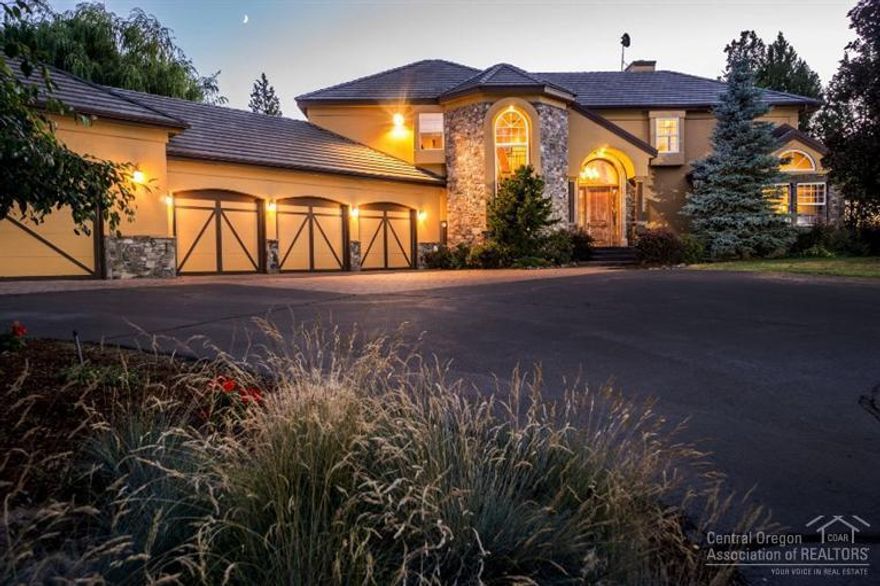 This gorgeous 5 bedroom, 3 bath, 3597SF home features a beautiful entry leading you to an open & inviting living area, gorgeous kitchen w/ dining/family area & pizza oven, office w/ built-ins, fireplace & private patio, master bedroom w/ huge walk-in closet, private deck & hot tub. Extensively remodeled in 2010; designer touches & high end finishes throughout the entire house! All this & more on 19.55 acres, 11 COI irrig acres, fenced/x-fenced, 4320SF AG/RV Bldg, 2160 SF Barn/Shop & irrig pond.