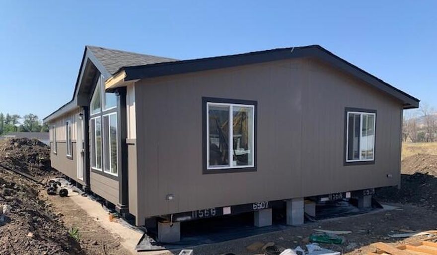 Here's a new listing #93 in popular Mountain View Estates, a 55+ community.  Mountain View Estates is still owned by the local family that developed it in 1987. 21 homes of the 164 homes survived the Alameda Fire of 2020.  The park is being restored & is now welcoming new and returning residents to this vibrant community.  There's a brand-new dog park and mailbox kiosk with parking at the entry. This brand-new Skyline 3 bedroom, 2 bath home is just the right size & the right floor plan if you're looking for 2 bedrooms plus an office.  The large master bedroom runs across the back of the home.  Double vanity in the bathroom with a generous linen closet too. The kitchen & living area are in the front with views of the neighborhood.  There are plenty of counters & cabinets to please the cook.  You've got plenty of space for your cars under the carport.  Vinyl fencing & drought tolerant landscaping included along with sewer & trash. One small pet up to 25 lbs allowed. Interesting?  You bet