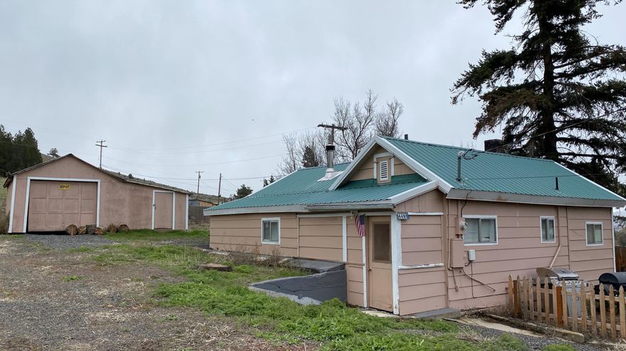 Country setting with room for a shop. Located just outside of Klamath Falls on just under an acre. This home has 2 bedrooms, 1 bath, metal roof, detached garage/shop and lots of potential.