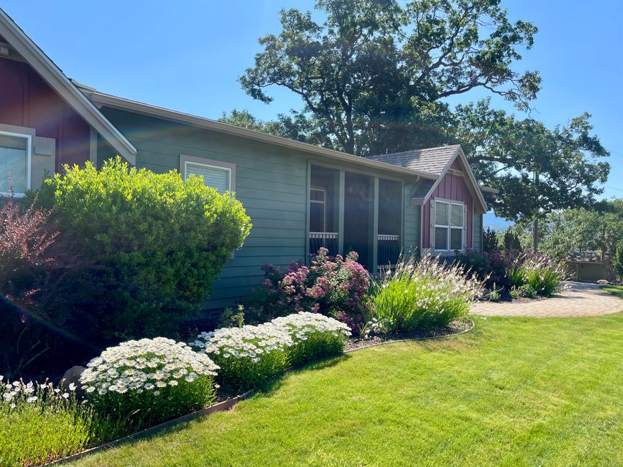 ''Unique Ashland property with potential as winery, small farm, ranch or horse property. This home has stunning 360-degree views of Emigrant Lake and the Siskiyou Mountains.  A large double-car detached garage with separate climate control has additional workshop space. This 9.38-acre estate consists of a fenced grassy field and a 1500-sf barn with electricity and water.  The custom home has 2775 sf, four bedrooms and three full baths. There is a gourmet kitchen with a walk-in pantry and all stainless steel appliances. The open floor plan is single-level with a large, recently updated primary suite. This is a ''must see'' property to fully appreciate its incredible beauty, views and privacy. The home has a large, fully landscaped yard, a large outdoor entertaining area, and a 56-gpm well.  Relax in the hot tub with views of Emigrant Lake under starry skies.''