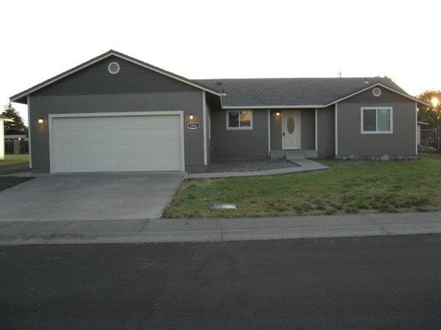 Wonderfully updated home in the Americana subdivision. This home has been newly painted on both the inside and outside. New carpeting has been installed. New stainless steel appliances including a gas range and stove for the chef. Bathrooms have also been updated. Nice area for RV parking.This beautiful suburban home is close to the airport and is also conveniently located near schools and public transportation. This home is truly move in ready.