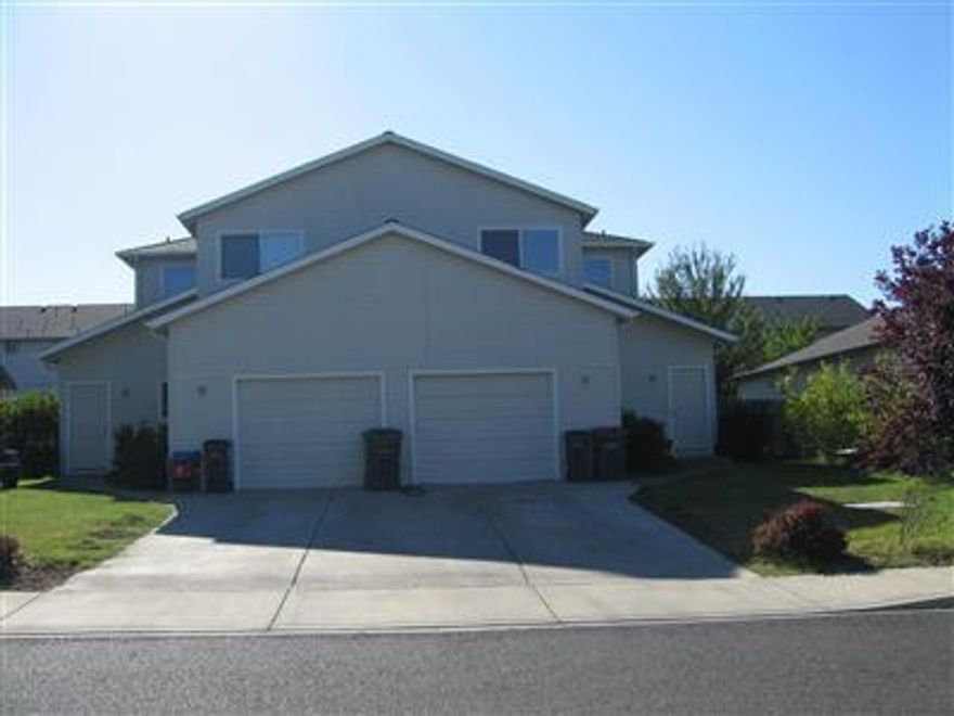 Great investment property! Nice open floor plans with individual back yards. 2 bedrooms/2.5 baths Quiet neighborhood and convenient location. Shows well and has long term tenants. Don't miss this hard to find duplex property!