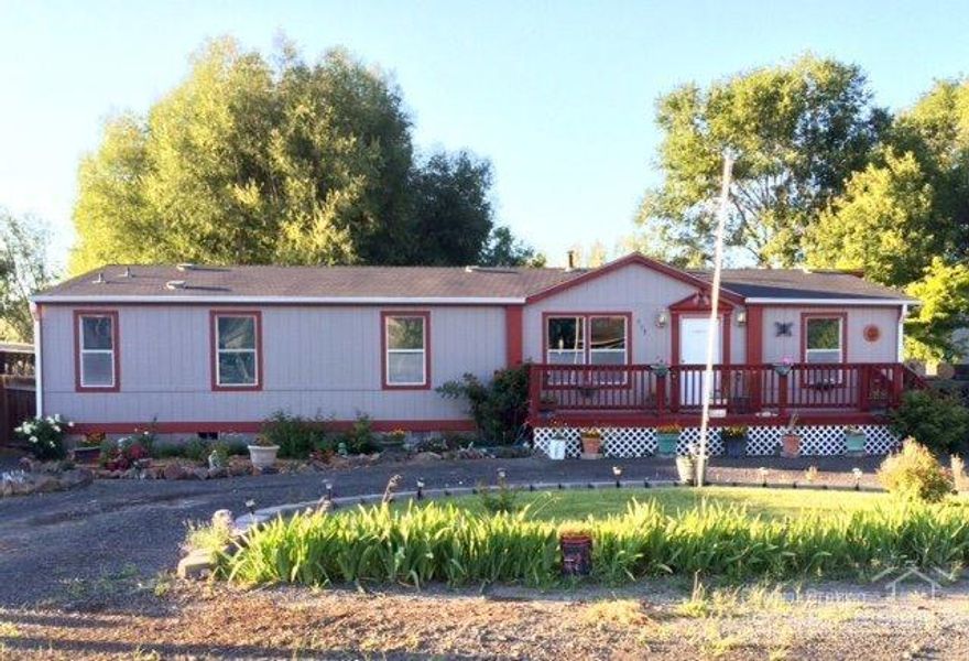 Nice clean home in town. Great floor plan with a large kitchen and tons of storage. Nice lot with a fenced yard with fruit trees, greenhouse and private well for irrigation. The exterior of the home has recently been painted. Two decks perfect for entertaining!