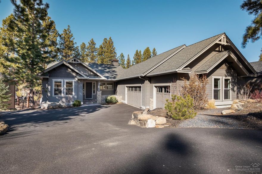 Like new custom built home in The Reserve at Broken Top! Gorgeous hardwood flooring and custom built-ins create a warm and inviting first impression as you enter the heart of the home. The open floor plan provides a great flow from the designer kitchen with granite slabs to the spacious great room with an adjacent covered porch. Abundant natural light provides a perfect space to entertain or enjoy the serene setting. Main level living boasts two spacious master suits. Lower level provides a bonus room, two guest bedrooms, full bathroom and a private paver patio. Beautifully landscaped with native plants. There is plenty of room to store all of your toys in the attached, 3-car garage PLUS a separate 320 sq. ft. heated shop. Great NW Bend location! Walk out your back door to the Cascade Highlands Trail.