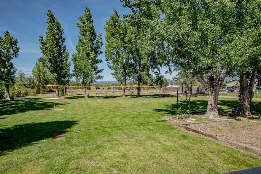 Are you looking for the perfect 2 family set up on nearly 4 IRRIGATED acres? Look no more! TWO HOMES ON ONE TAX LOT. This beautiful piece of land has so much to offer. Situated close to town with that sweet country feel.  The main house boasts just over 1800 square feet with the opportunity to add your own personal touches.  The second MF home is just shy of 1200 sq ft, newly remodeled throughout the inside with paint, flooring, kitchen and bathroom upgrades. Offering LOTS of storage. It is beautifully landscaped, fenced and peaceful.  Also included in the sale is a nearly brand new Tuff Shed. Bring your 4H projects, animals and/or toys along with your family and friends.  Enjoy the inescapable views of Mt. McLaughlin while taking in all the space and pleasures these homes and property have to offer.