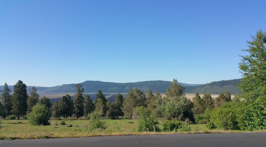 Scenic views in a peaceful setting. Large .86 acre lot in the West Ridge area of Running Y is ready for your dream home. Amenities include the Arnold Palmer designed golf course, spa, ice skating, horseback riding, hiking & biking trails. Some of these are seasonal and may require additional fees. HOA fees are $300 per quarter and include access to the Sport Center with an indoor pool, hot tub, tennis & athletic courts and a fitness room.