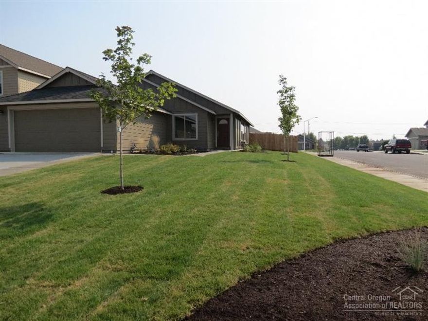 You are going to love this new construction home in SW Redmond! Offering over 1500SF, 3 bedrooms & 2 full baths. The interior offers wood laminate flooring, knotty Alder cabinetry & tile backsplashes in the kitchen & baths. The kitchen and dining are open to the great room which offers lots of natural light. The master features a spacious bedroom & bathroom w/corner soaker tub, shower. Full yard landscaping w/sprinkler system and fencing. Model home open Friday through Sunday 12 to 5.