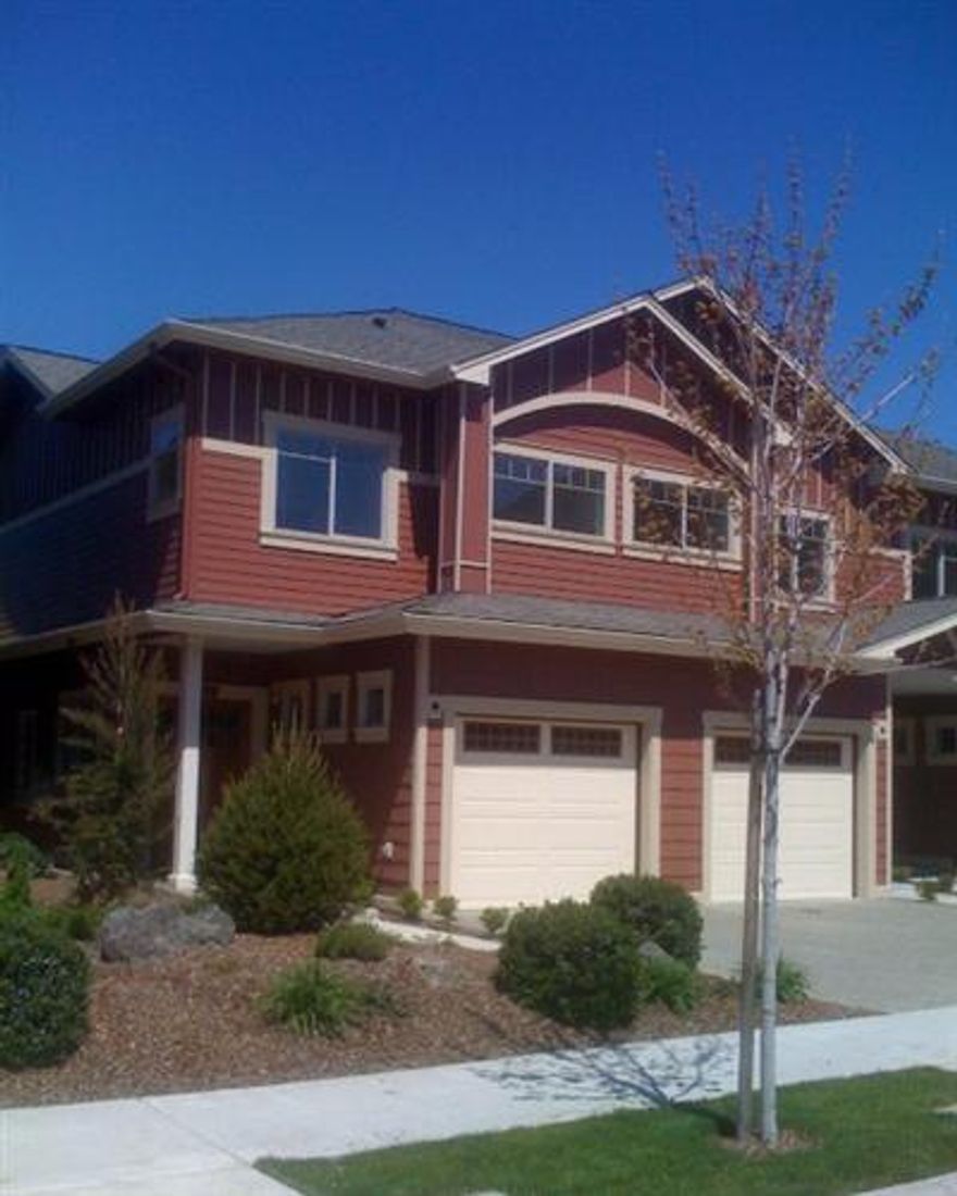 Many upgrades to this 2-bedroom end unit in award-winning Sequoia Village with great views of mountains on quiet Kids Way. Each bedroom has own bath plus half bath on main level. Nine foot ceilings thruout home w/Hickory engineered wood floors, enlarged kitchen with upgraded granite countertops and peninsula w/large single bowl granite composite sink with Kohler faucet; custom cabinetry with pull out drawers, upgraded SS appliances, including Thermidor d/w; custom Bali bottom up-top down blinds thruout home; solid stained wood doors and wood window sills downstairs, granite vanities in all bathrooms-master has large linen/storage cabinet; upgraded lighting and fans thruout home. Enjoy the great amenities - beautiful clubhouse for parties - includes pool table, workout equipment and flat screen t.v.; pool and hot tub. Close to dining and shopping. Wonderful place to call home!