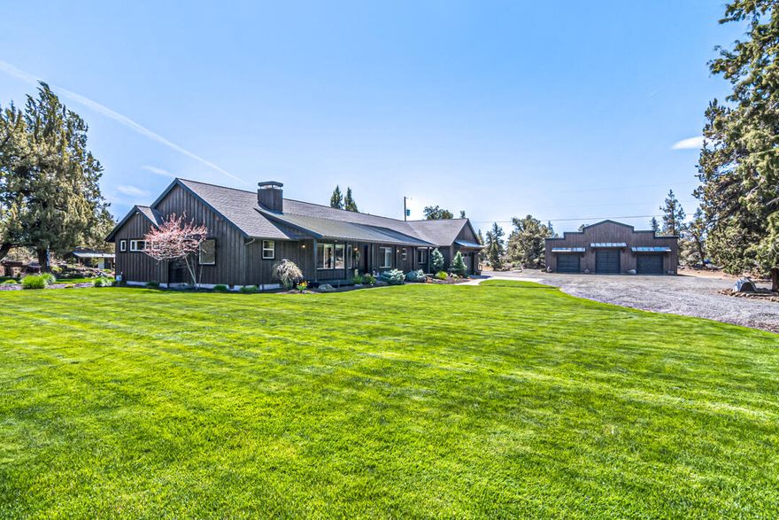 This custom 2,566sf home 4bed/2.5bath, office and bonus room. Wire brushed oak floors, stained hickory cabinets with solid surfaces. Vaulted ceilings in living room with floor to ceiling gas fireplace with built ins. Kitchen has double wall oven, cooktop with hickory hood, corner pantry, black leathered granite with full tile backsplash and under/over cabinet lighting.  Master bedroom has a walk in tile shower, heated tile floor, soaking tub, double vanity and separate toilet room. 2nd bath includes shower/ toilet in separate room, double vanity & large linen. Laundry w/extra cabinetry, quartz counters, full tile backsplash and sink. Built-in Vac, speakers throughout. Paver driveway, walkway & patio outback with pondless water feature, fire pit. Beautifully landscaped. Sprinkler system, horseshoe pit, play structures, treehouse, fenced raised bed garden with drip system, fruit trees, large shed/chicken coop w/fenced run. 4-h area. Heated Bunkhouse. Custom 3-bay shop to match home.