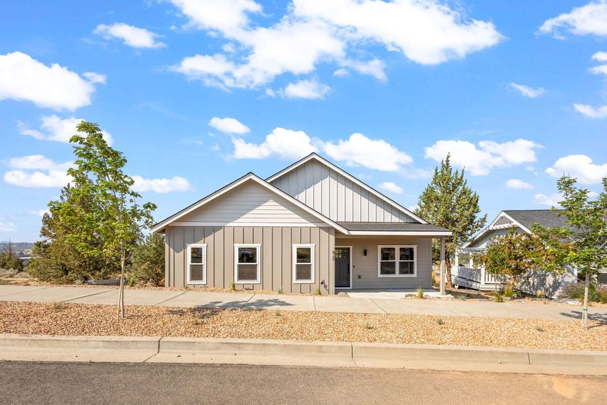 Price Improvement on this New Construction, Masterfully designed 1,978 sq ft living space capturing breathtaking views of Mt. Jefferson, Mt. Hood, The Three Sisters! 	3 bedrooms, Den ,Bonus room, 2.5 bathrooms, 12'x18' covered deck with cable railing, Covered front porch. Custom cabinets with 42'' uppers , Soft-close doors and drawers, Dedicated trash/recycling pullouts, Crown molding, Full tile backsplash, Quartz countertops, Stainless gas appliance package. Oversized garage with epoxy finish.  Laminate vinyl plank flooring throughout main living areas, Full wood-wrapped windows, 6'' baseboards, Christmas  outlets in eaves, Gas BBQ connection, Air conditioning, Professional landscaping.