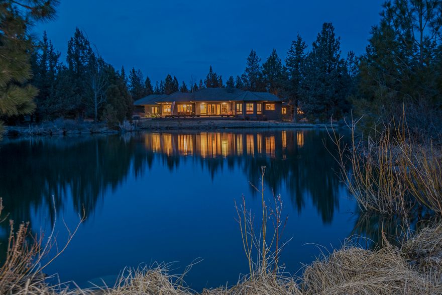 Water and mountain views! In the gated community The Ridge at Indian Ford, this home is only 3.5 miles from Sisters. Designed by Steven Van Sant, built with old growth clear cedar siding, tile roof and carved stone. Kitchen has leathered granite, SubZero refrigerator, Bosch appliances, walk in pantry, formal/informal dining. Throughout are custom built-ins and upgraded carpet and flooring. Walk-in coat closet and propane fireplace. Total square footage includes detached 843 sq ft office/flex space with full bath, sink and sauna. Primary suite has an adjoining office/retreat space. Travertine bathroom remodels. Heated 3 car garage w/ workspace and indoor/outdoor pet area.