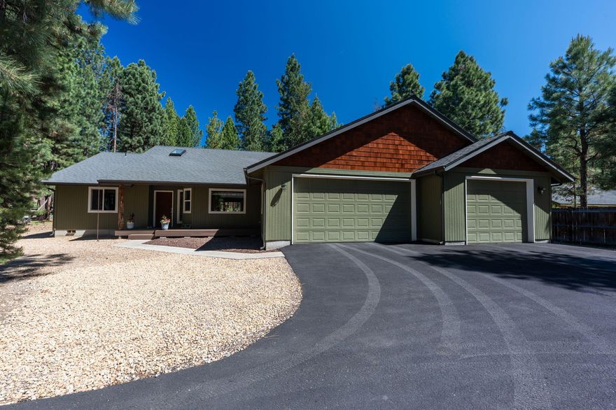 Nestled in a serene setting, this single-level gem located just outside SunRiver Resort, is a perfect blend of comfort & functionality, backing directly onto expansive USFS land for unparalleled privacy & natural beauty. The property is close to the Deschutes River & conveniently located near the road to Mt. Bachelor, w/ shopping close by. This meticulously maintained home features 3 bed/2 bath, including dual primary closets for ample storage space. Inside, the home offers a spacious great room concept, ideal for both everyday living & entertaining. The dedicated office space provides a quiet retreat. Enjoy the newly added partially covered outdoor entertainment patio w/ a built-in hot tub, perfect for gatherings. Car enthusiasts will appreciate the detached shop w/ Radiant Floor Heating, car lift & loft storage, providing space for projects. The property boasts a paved driveway equipped w/ convenient RV hookups & a sewer connection, making it an ideal spot for adventure enthusiasts!