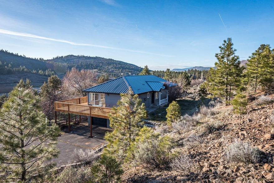 5 acres, privacy, gorgeous views of Shasta and surrounding mountains....... if this is what you're looking you've found it! 4 bedroom, 3 bath home located just minutes from downtown. Home is surrounded by pine and juniper trees. Many windows bring in an abundance of natural light. Large deck to fully enjoy the beauty, peace and quiet that this property has to offer. Make your viewing appointment today!