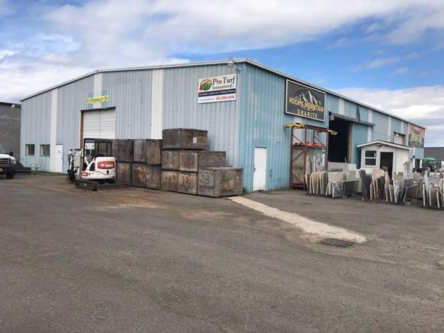 Prime location with easy access. This quality warehouse has 10,000 sq ft and features 4 bathrooms, 3 offices, 4 roll up bay doors and is fully insulated. Ample parking. On two tax lots.