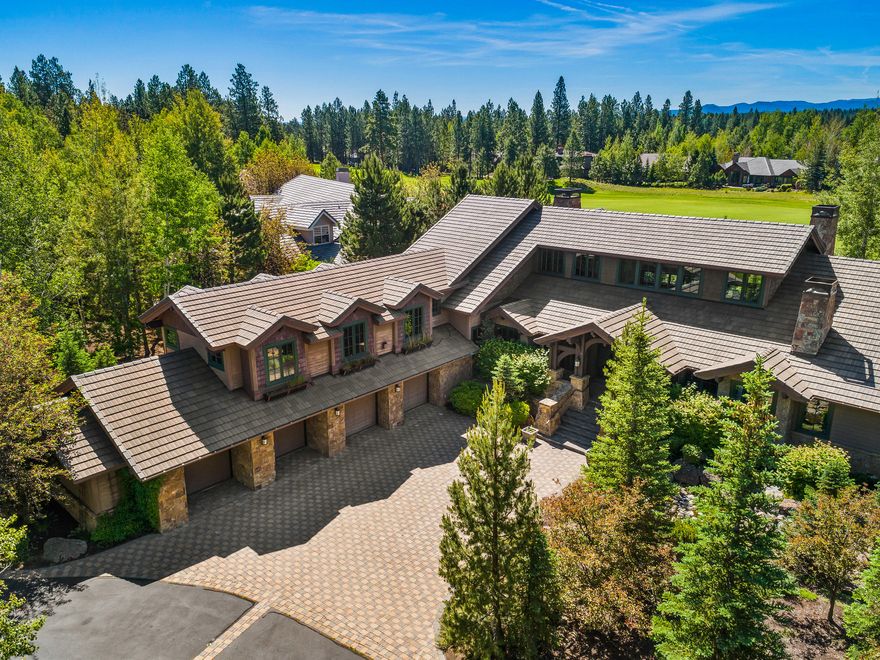 Elegant south facing home on a .99-acre double lot in Broken Top in the heart of bend. Exceptional artistry and craftsmanship went into the construction of this amazing home which boast dramatic finishes throughout. Over 4000 sq feet of single level living at its finest. The spacious great room features a timeless floor-to ceiling Montana Moss fire place, black walnut floors and mahogany cabinets. The master suite is a true oasis with fireplace, his/hers closets and spa like master bath with a beautiful soaking tub overlooking the enclosed secret garden plus sauna, workout room & steam shower. Kitchen, office, library and laundry can also be found on the foot main floor. All additional bedrooms are upstairs and have their own en-suite baths and the large bedroom above the oversized 4 car garage has a FP, wet bar and workspace it would make a perfect guest suite or bonus room for entertaining.  Freshly painted inside and out and elegant new lighting installed.