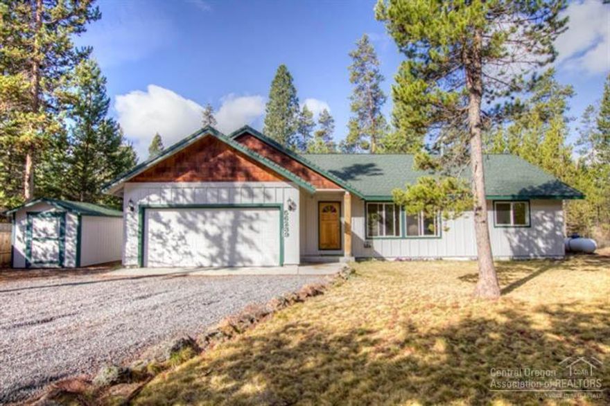 Charming home with a terrific location! Near the Deschutes River & boat dock on almost 1/2 acre lot. This delightful 3bd/2ba single level home features master bdrm separation, room for animals & toys. Vaulted great room w/river rock fireplace, open kitchen w/center Island & sitting bar. Master suite w/private bath & separate patio area. Room to park an RV & boat-plus nearby neighborhood boat launch. Ceiling fans, frame built storage building, attached 2-car garage, large dining area & 2 patio areas.