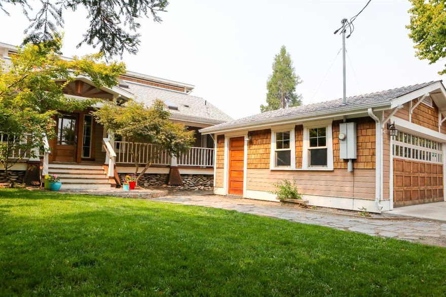 This 1930 Craftsman home has been lovingly restored and improved over the years with recent wood floor finishing and custom window blinds installed. Large covered front porch greets you as you pass over the cobble stone walkway. Once inside the warm hardwood floors, gas woodstove and country kitchen set the tone for comfortable living and classic design. Behind the house is a 10' x 20' completely remodeled heated office/crafts room w/220 electrical service which can be used for many different uses. Conveniently located near schools, shopping, services and highway access. This country classic home awaits your arrival!