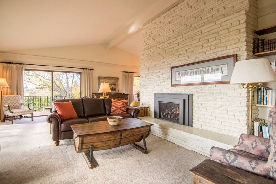 Countless reasons to love this property. This home sits up on a private .60 acre lot with gorgeous Ponderosa pines. The double door entry to the foyer features high ceilings, oak hardwood floor. Easily entertain your guests in two dining areas and remodeled, kitchen with cozy wood burning fireplace. The family room boasts floor to ceiling windows which pour in abundant light and allow you to take in views of the Valley. Vaulted ceiling and exposed beams bring character. Enjoy the sunset from the peaceful private deck in a park like setting. Both wood burning and natural gas fireplaces with brick surround deliver warmth and charm. The master bathroom has been remodeled with beautiful tile work, ambient heated tile floors. Plenty of extra space to customize to your desires. RV parking 13 X 31 to accommodate your toys. Don't miss this rare opportunity to have a large private lot in East Medford only 5 minutes from all the convenient amenities.