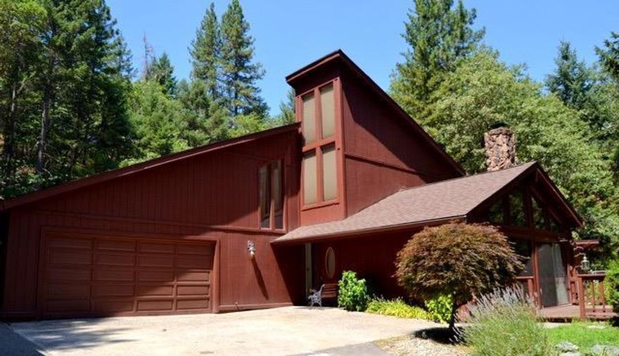 Unique custom contemporary District 7 home with lots of privacy. sitting on over 3.7 acres at the end of a cul-de-sac has all you want and more. living and Family room. RV parking, Views, In ground pool. yards away from The Grants Pass golf course and close to town. All this for a low price.