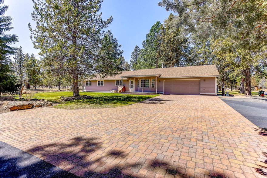 Own a Piece of Paradise & 300+ feet River Frontage in NW Bend! Incredible 5.36 acres backing Tumalo Creek white water! 4Bd + Office/2Ba custom single level NW Ranch style home built with 2x6 inch stud walls – greater insolation thickness for energy efficiency. Features: Maple HW plank floors, vaulted GR, newer wood stove, tile hearth, open dining area, kitchen granite counters, SS appls, tile floor, lg master suite & prvt bath double vanity, walk-in closet & private access to Hot Tub, laundry room w/tile floor & W/D, att'd 2-car garage, 1200sf heated/insulated Shop w/14' rollup doors, 55' & 42' RV cover wings, office & built-in storage! Multi farm animals FFA Several outbuildings including horse barn w/ tack & 2-stalls, animal building, chicken coup and utility/firewood shed.
  Pastures and lawn w/1.5 acres Tumalo irrigation rights feeding 7ft deep pond and underground smart irrg sprinkler system.  A trout filled river in your back yard, an amazing place to call home.