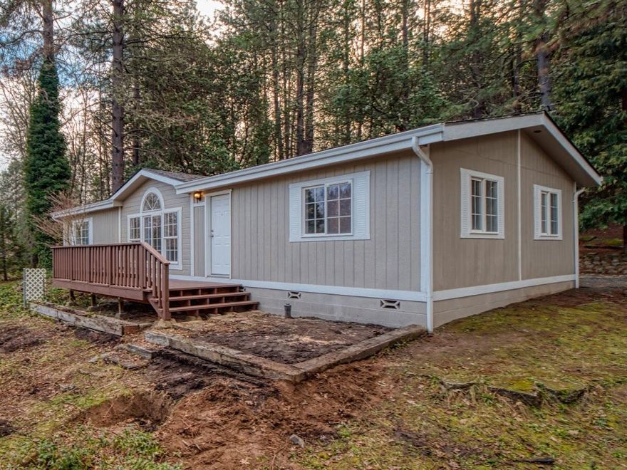 Open House this Sunday (2/6) from 11:00-2:00! Come see this completely redone 3-Bedroom/2-Bathroom manufactured home on a half-acre. Outside improvements include new exterior paint, new roof, new french drain and a new deck. Inside find a new kitchen with new cabinets, countertops and stainless steel appliances. Throughout the home is new paint, flooring and lighting all conditioned by a brand new HVAC system. Both bathrooms include new vanities, hardware and toilets and are serviced by a new water heater. Strong well at 12 GPM according to a 11/2021 flow test. Listing agent is related to seller. With low property taxes of only $956 per year this turn-key home won't last long!