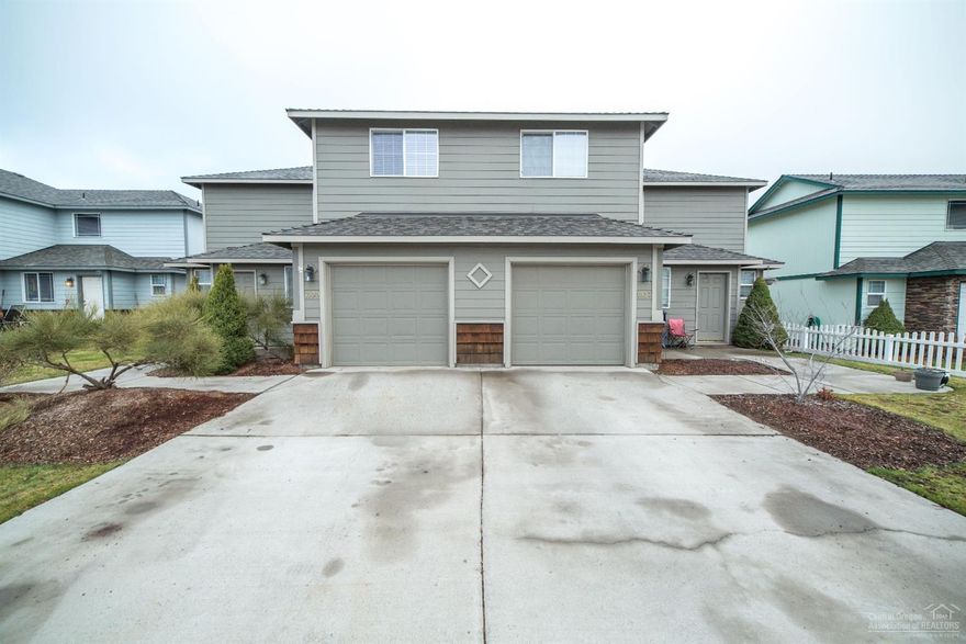 Spacious, well-cared for 3 bed, 2.5 bath duplex on quiet cul-de-sac with easy access to local amenities wiht attached single garages and large vinyl fenced backyards. No pets on property. Unit 1939 has newer stainless steel appliances, within the last 5 years. Interior/exterior paint and carpet replaced in both units. Gas fireplace in each living room. Gas forced-air furnace and A/C. All leases month to month. 1934/1936 NW Larch Spur Ct. duplex directly across the street is also for sale by same owner.