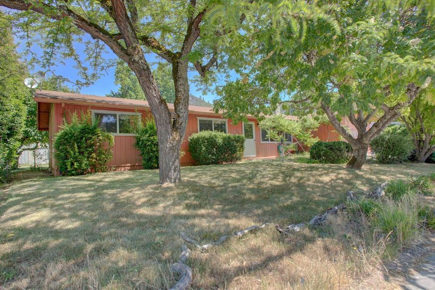 Looking for a place to call home? Located on a large lot (.28 acres) with District 7 schools, there are 4 bedrooms and 2 bathrooms. There is a 1 car attached garage and a detached shop with power to it plus a small metal shed in the back yard. Speaking of the back yard, enjoy afternoons under your covered patio and feast on the fruits of your garden: Persimmon, Fig, Plum and Grapes. Beautiful, mature trees provide shade in the front and back yards. This affordable home will shine with your updates.