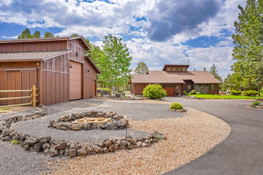 Amazing one level ranch style home on 2.45 beautiful acres. The living room, kitchen and dining area are open and inviting. The Great room opens to the back deck with amazing views of The Three Sisters, other Mountain ranges, and beautiful Sunsets! . Soaring stone fireplace connects to vaulted ceilings boasting tongue and groove cedar. Hard wood and Slate tile floors throughout the home. French doors leading to the back deck in the Primary bedroom allows tons of sunshine in. Attached over sized 2 car garage offers spacious storage. New 36'X36' Barn/shop offers stunning views of the mountains. With 3- 12' x 12' stalls, a tack room, ideal for gear/ weight room/storage, built in 2022 contains office/bedroom with a full bathroom. Ideal for a home business, visitors or in-laws.  Property shown by appointment only,