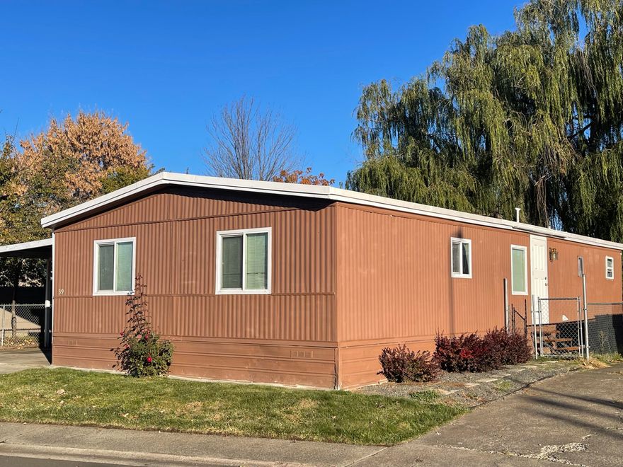 Back on market through NO fault of the home! Sellers have found new home & are ready to move!!!!! Bring your offer for this Neat, clean & WELL MAINTAINED 3 bedroom, 2 bath manufactured home in the Aloha Sun ALL AGE - pet friendly MH Park. Light & bright kitchen with an open floor plan. Plenty of room for your furniture. New composition roof, metal siding & skirting all in very good condition. Carpet, laminate & vinyl flooring all in very nice condition. Gated & fenced front & rear yard. Covered patio. Motion sensor lawn sprinklers for easy lawn maintenance. Monthly land lease only $625 + $14 for trash. Washer/Dryer, refrigerator, dishwasher & stove all to stay! This home is ready for you and your family. Don't miss out schedule your showing today!