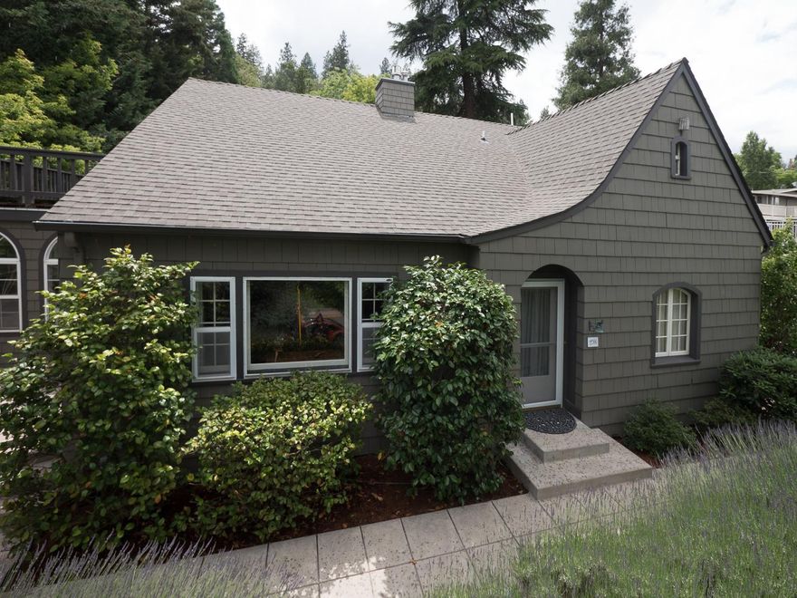 Famous Robert Hargadine house, one of Ashland's founding citizens. This charming beauty is located just steps away from Shakespeare Theater, Lithia Park and the Plaza. Surrounded by dazzling landscape the main house features 3 beds, 2 baths, unfinished basement, 274SF (not included main house SF) guest cottage, hot tub, sauna, sun-room, hardwood and tile floors, granite counters, Dacor gas stove, 3 decks and French doors. Simply a perfect location with great views of Grizzly Peak.