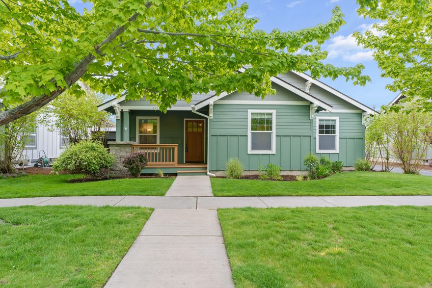 Nestled in a desirable NE neighborhood, this beautifully maintained, single-level home offers 3 bedrooms, 2 baths, and 1,430 sq ft . With an open floor plan, vaulted ceilings, and new carpet, it's perfect for both relaxing and entertaining. The great room flows seamlessly into the dining area, featuring wood floors and fresh paint throughout. Just off the dining room, the kitchen is both functional and spacious, with a door that opens to the backyard—ideal for easy outdoor access. The primary suite is separated from the other two bedrooms for privacy, while the manicured yard with mature trees offers a peaceful retreat. Enjoy some mountain views from the covered back porch or tend to the raised garden beds in the fully fenced yard. Additional features include AC, alley access, a shed for tools, and work benches in the two-car garage. Conveniently located near schools, shopping, medical facilities, breweries, and restaurants. Move-in-ready!