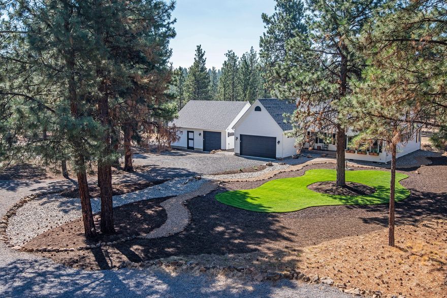 Complete Privacy on over 40 acres of forested land that backs up to public lands. Brand New 5,500 sq.ft. 3 Bay shop with 4 RV Garage Doors and a Large heated & air conditioned office, 72'' remote ceiling fans, LED lighting throughout - this shop must be seen to believe!  And it's beautiful with a balcony that looks over the property! The Country Farm House is 2,273 sq.ft. with 4 bedrooms and 2 1/2 baths.  The house has been completely updated with new appliances and washer & dryer. The exterior has been freshly painted.  Long 3/4 of a mile winding driveway - this setting is like something out of a movie. 2 car attached garage with additional 1 car attached garage. Huge back patio looks out over a meadow and forest to view the wildlife that live there. Quiet and serene yet only 10 miles to the quaint town of Sisters, Oregon. This property is just what you've been looking for!