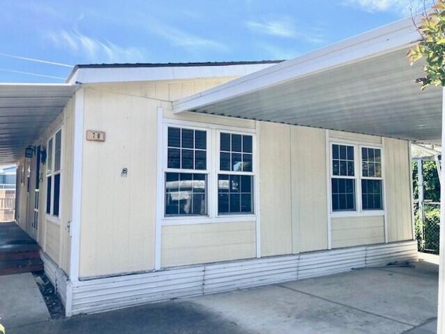 Cute home tucked away in Glenwood Mobile Park, a 55+ community.  This 2 bedroom/2 bath home is ready for your personal touch!  The home comes with all appliances. There's a huge pantry for all your storage needs. Outside you'll find a nice deck, large storage shed and a side-by-side carport.