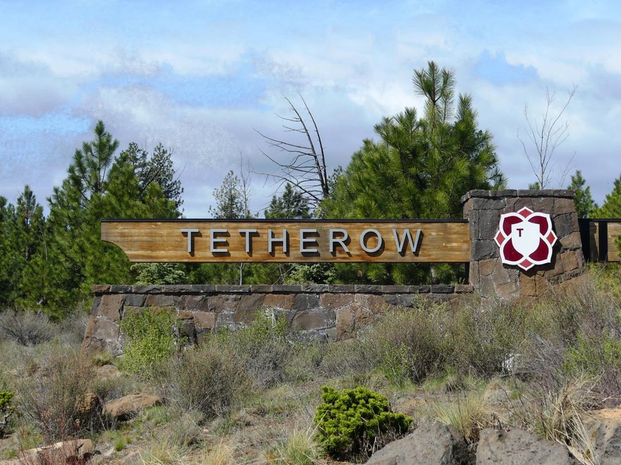 Welcome to Chalet, a collection of 12 beautifully designed reverse-living townhomes with a mountain modern aesthetic and a touch of European design. All of these stunning homes include fine finishes, modern lighting fixtures, and unique
accents throughout. This Dolomite floorplan home offers 2,480 square feet of living space, featuring two full suites on the ground level and an owner's suite on the main living level. In the great room, entertain guests by the gas fireplace, or open up the panel of sliding glass doors to the expansive covered deck for easy indoor-outdoor living. Chefs will
love the well-appointed kitchen, featuring a quartz island with breakfast bar and Thermador appliances. Chalet is conveniently located just steps from the new pool and all of the amenities of Tetherow Resort, and offers easy access to shopping and dining, miles of hiking and biking trails, and Mount Bachelor.