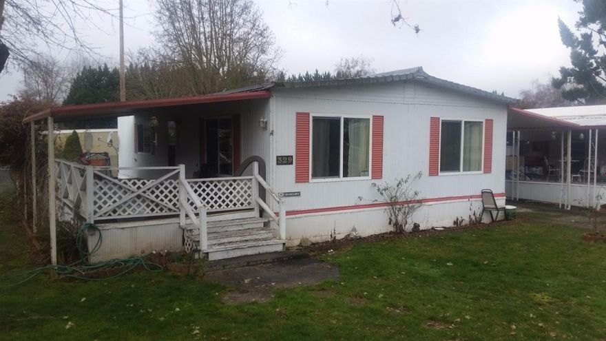 Come visit this home at Country Estates Mobile Home Park. Rogue River frontage is on park property. This comfortable 960 sq ft home has a covered deck and a storage shed. This a 55+ park. Owner is moving out of state living with her daughter. No inside showings until after Feb 10th 2016 due to moving out and cleaning!!