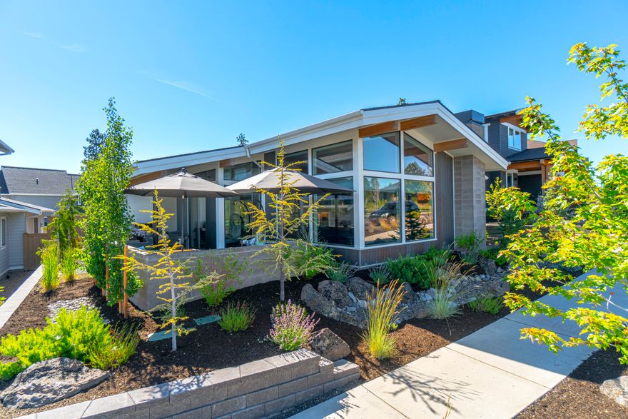 Coveted, lightly lived in, single level mid century modern home in desirable Northwest Crossing. Conveniently located near the new Grove eateries, schools, down town NWX, trails & Discovery Park.  
Built by the highly sought after Structure Development NW, this 3 bed, 2 bath home offers luxurious living both inside and out. The great room floor plan flows beautifully with a large quartz island/breakfast bar, hardwood, abundant natural light, 5 burner gas range, designer touches throughout. Primary has a beautiful walk in tile shower, dual vanity and a walk in closet with full closet system. Laundry room has storage galore, complete with a laundry sink and drying rack. There are many thoughtful updates in this better than new home.   The spacious outdoor patio is perfect for entertaining or just lounging. Complete with Control4 system and extended internet.  
You won't want to miss this special home!