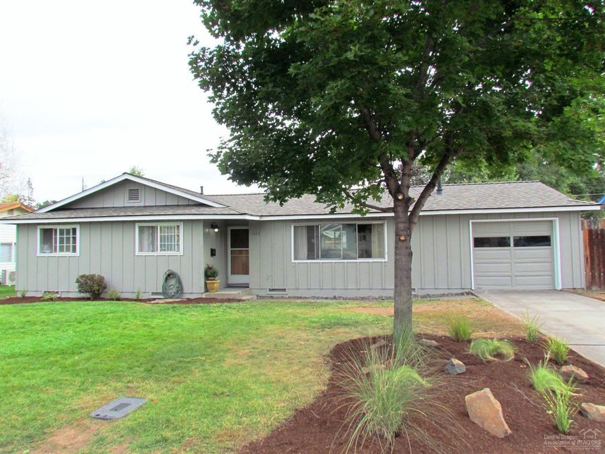 Offering this large NW Redmond 4 bedroom ranch home very near the Dry Canyon and Stack Park. Many updates and features include brand new roof and HE furnace, new exterior paint, original and beautiful oak hardwood floors, huge master suite with vaulted ceilings and an attached office or nursery room, kitchen butcher block counters, new tiled floors, new gas fireplace and mantel, updated bathrooms, new back yard grass and landscaping with UG sprinklers, play house, alley access for RV parking and more!