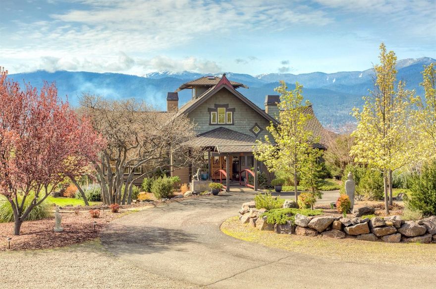 Stunning Ashland Asian Contemporary Craftsman home by local Designer/ Builder Clay Colley. Situated on 6.88 acres in Ashland's most sought after rural location you will marvel at the artistry & vision brought to the creation of this home. An arched Moongate & dramatic views of Mt. Ashland highlight the entry. Reclaimed clear Cedar walls & heated cork & slate floors create a rich & earthy warmth. The entry opens to the Great Room with 26' vaulted ceilings, walls of windows & the valley beyond. The open floor plan features spectacular vistas in all directions. Main level features Great Room, Family/Media room, Gourmet Kitchen & Dining Room. All encompass an open floor plan. Also on main level is the Master Suite & Office. View decking with spa opens off of the great room & master. Upper level has loft space with views. Lower level fully contained living space features living room, kitchen, 2 bedrooms, bath, laundry & garage. Separate apartment above garage. See amenity list & brochure.