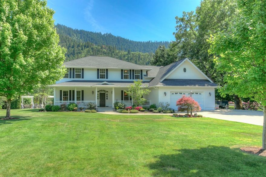 Perfect blend of luxury and country on the Rogue River! With a contemporary flare, beautiful finish work and exquisite attention to every detail, the 4604 square foot home is not only elegant, it is a very comfortable home that your family will love. The main level features a welcoming covered front porch and entry, formal Living and Dining Rooms, Family Room, Breakfast Nook, fabulous Gourmet Kitchen, spacious spa-like Master Suite and Laundry Room. A second Master Suite plus 3 additional Bedrooms, full Bath, Hobby room or Office and a Bonus Room complete the upstairs. The furnishings have been professionally selected to complement the home and may be available. On 3.44 acres, the extensive outdoor living space includes covered and uncovered patio areas, custom 20x40 pool with cascading waterfall, lawn to the river, fruit trees, garden area, dog kennel, fenced pasture, over sized garage, generator room, RV and boat parking, and much more! Call to arrange your private showing!