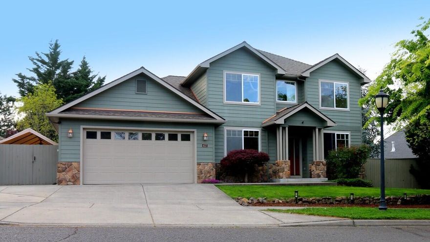 Welcome to this beautiful home in the desirable Summerfield neighborhood! This 2,483 sq ft residence offers 4 bedrooms, 2.5 bathrooms, and sits on a generous 0.24-acre lot. You'll love the elegant hardwood and tile flooring throughout the main living areas, as well as the stylish kitchen featuring granite countertops, a pantry, and ample cabinetry. The cozy family room is centered around a gas fireplace, perfect for relaxing evenings. The primary suite is a true retreat with ceiling fan, recessed lighting, and a luxurious ensuite bathroom with a large soaking tub and a tiled shower. Each of the four bedrooms has a walk-in closet. The oversized garage includes additional space perfect for a golf cart or extra storage. Only a 4 1/2 minute ride in the cart to the first tee of the RVCC!   Step outside to enjoy a private and thoughtfully-designed backyard with a covered patio, hot tub, putting green, and side yard parking—ideal for RVs, boats, or other toys. This home checks all the boxes!