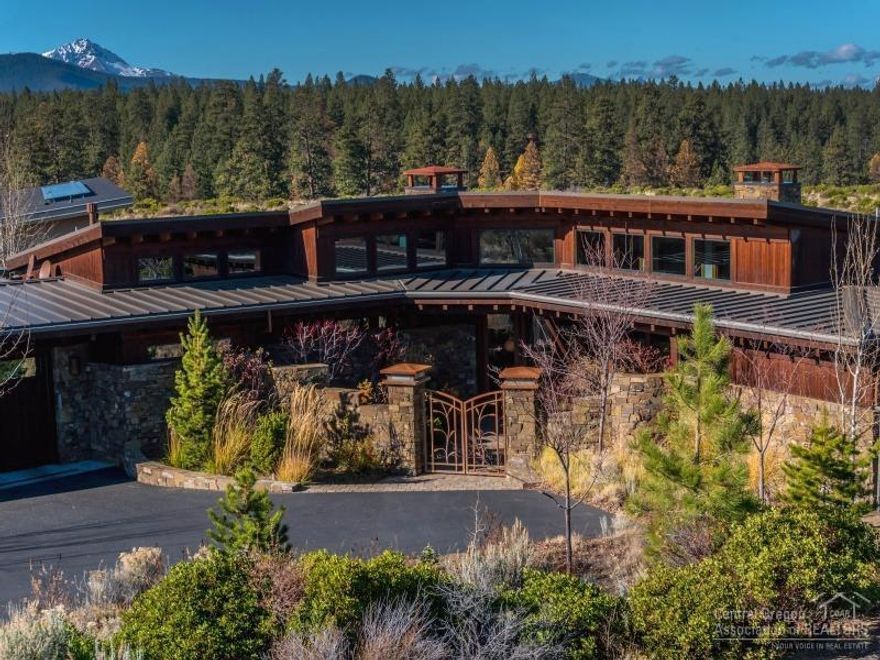 Shevlin Commons gem designed by award winning Wright Design Studio & Built by Steve Stanfill. A home for those who value quality in all details seen & unseen. Pristine single level Great Room plan is open & light. Sweeping Cascade Mt Views. Entertainer's gourmet kitchen, office, Master Suite + 2 bedrooms en Suite. Features: Custom Cherry cabinetry & floors, solid core Fir doors, clear vertical grain fir trim, extensive Bitterroot stone, nestled in a 43 Acre conservation community adjacent to Public Lands.