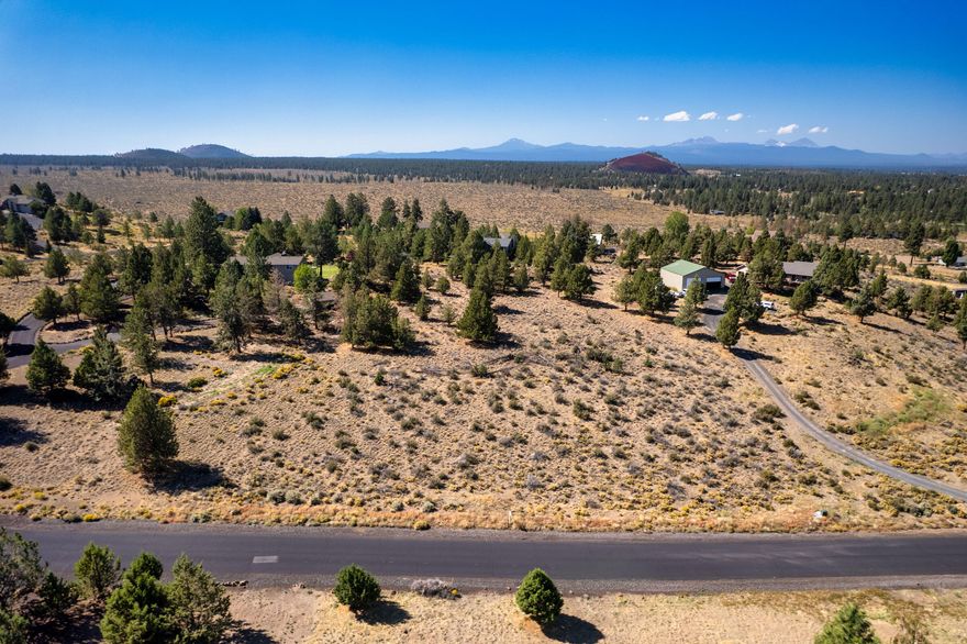 Rare 2.59-acre lot in Sundance East Estates offers the ideal combination of privacy and convenience. Elevated lot with views of Mt. Jefferson and the surrounding area, this is the perfect spot to build your custom home. Just minutes from downtown Bend, providing the tranquility of high desert living while being close to schools, shopping, and recreation. The Sundance East community has no HOA and borders public lands, offering easy access to hiking, running, and horse trails. This is a unique opportunity to own acreage with stunning mountain views, all within close proximity to everything Central Oregon has to offer.