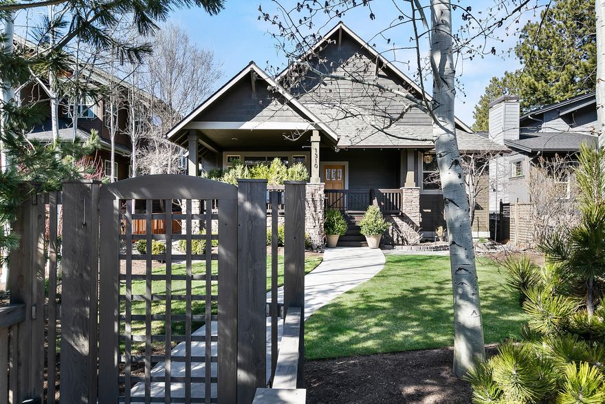 This Spectacular single level Pacific NW custom home is a contemporary masterpiece! Showcasing time honored features which include an open floor plan that flows seamlessly between the living, dining and kitchen, french doors opening to serene outdoor spaces, Chef's kitchen with a 6 burner Wolf stove and double ovens, huge center island and additional eating bar, solid Black Walnut hardwood floors, floor to ceiling concrete fireplace, artisanal powder room, whole house water filtration system and much more. Included in this stunning property is a thoughtfully designed ADU with vaulted ceilings, kitchen island, heated bathroom floor, ductless heating & cooling and the smartest use of space ever!  The exterior is breathtaking, with multiple outdoor living spaces that all join in perfect harmony, lovely fruit bearing trees and berry bushes, flowers galore and one dream Garden Shed. This is a fantastic one of a kind home, 1/2 block to Newport Market, and a 15 minute walk to downtown Bend