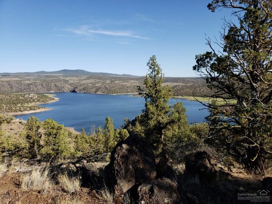 Beautiful views from this 5.2 acre parcel in Indian Rock Estates. In an area of nice homes, paved road and gated community. This property overlooks Prineville Reservoir and has unique views of several rock formations on and off the property along with outstanding terrain views - need to be seen to appreciate. There is a roughed in road going back to a landing offering the perfect build site, views and seclusion. Call for additional information and maps.