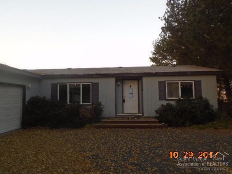 Sold As/Nice country setting with large trees.Tons of room to have a small in home business, guest quarters or hobby space. 2 manufactured homes on 1 lot but a hardship case needs to be filed with CC.Only 1 septic.Each has 3 bedrms and 2 baths so lots of space. One unit has a huge fenced backyard and there are 3 garages. Plenty of room for your toys. See attachment for PAS requirements and WFHM offer submittal information in MLS document section. Please submit all offers to the listing broker/agent.