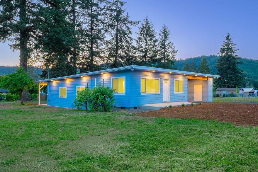 Almost entirely brand new construction! See feature sheet. Beautiful setting w/mature trees & mountain backdrops. Sunsets to hurry home to. Enjoy the benefits of small town living, with an easy commute of 30 mins. to Roseburg, 45 mins. to Eugene & just 1 hr. to Oregon coast getaways. Home shows fantastically. Pristine & bright w/hardie plank lap siding, fresh exterior & interior paint, high ceilings w/LED dimmable lighting, modern fixtures & warm luxury vinyl plank flooring. Natural light & views to spare from all new windows. All new electrical & plumbing. Daikin mini-splits. Split floor plan. Spacious living room. Impressive kitchen w/expansive granite countertops, back splash & bar, stainless steel appliances & shaker cabinetry w/soft close hinges! Matching granite & cabinetry in both bathrooms, plus towering tiled showers- dual heads in one & shower-tub combo in the other. Laundry w/utility sink. 400 sq.ft. carport w/lighted storage & EV charging. Listing broker related to seller.